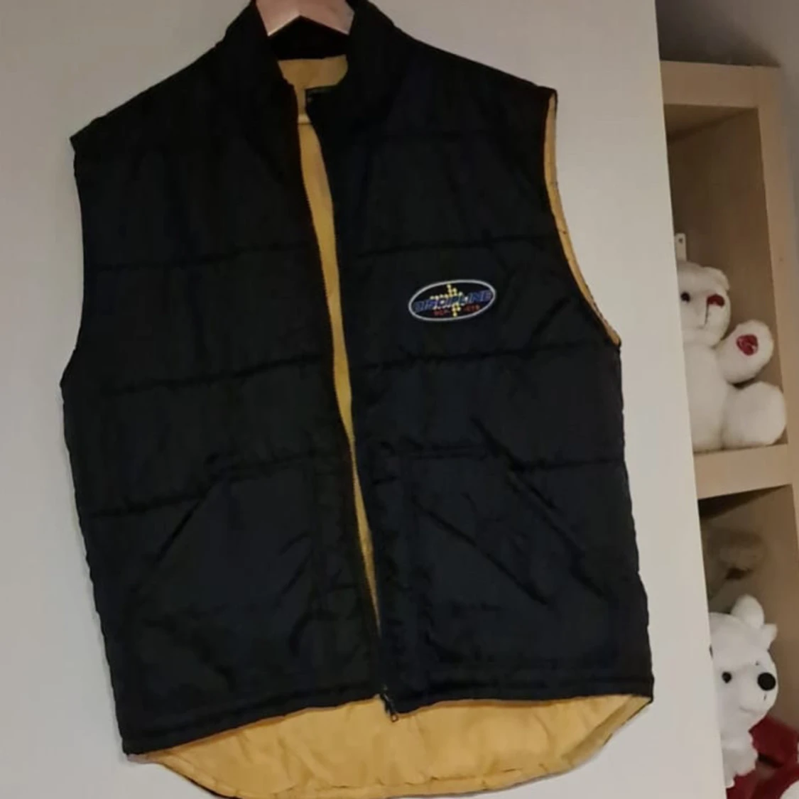 Svart quiltad dunväst