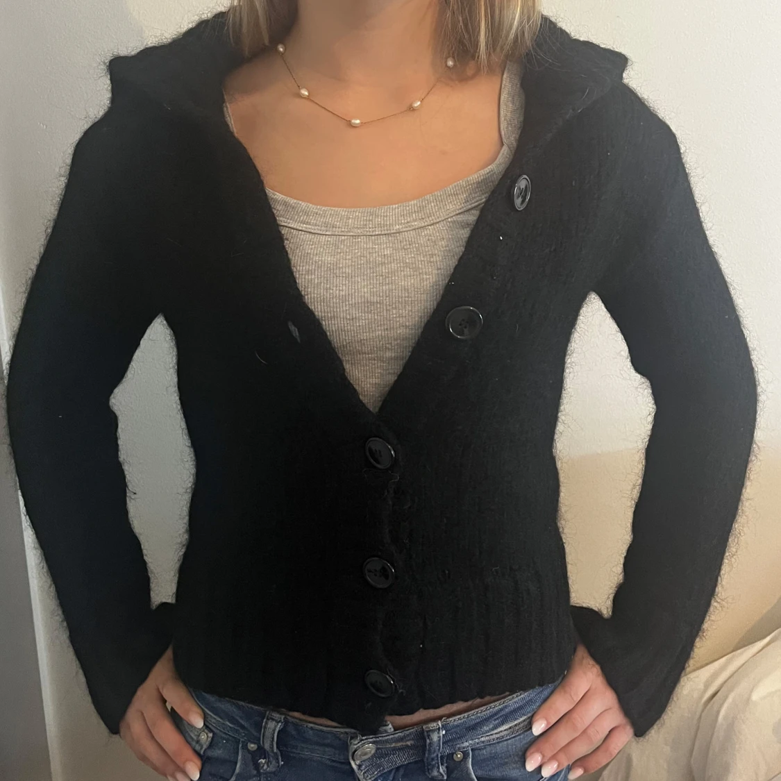 Svart kofta med knappar - 90