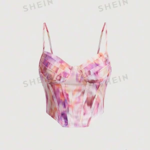 Färgglad korsett  - Snygg och färgglad korsett i ett härligt mönster med rosa, lila och orange toner. Den har justerbara axelband och en smickrande passform. Perfekt för sommarens fester eller en utekväll med vänner! Storlek M men mer som S