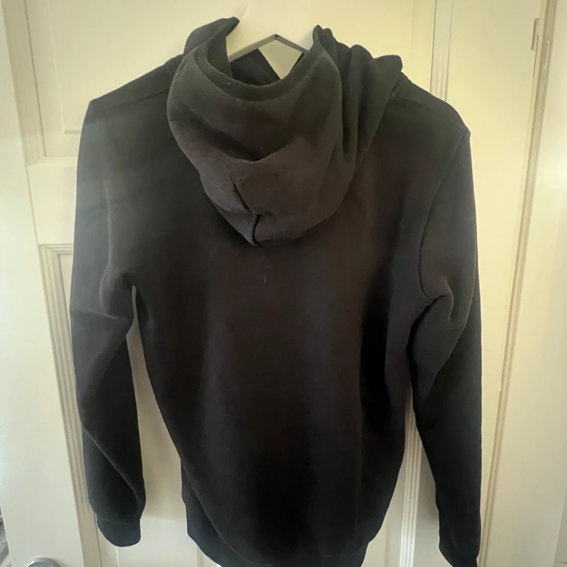 Svart hoodie från Peak Performance - 90