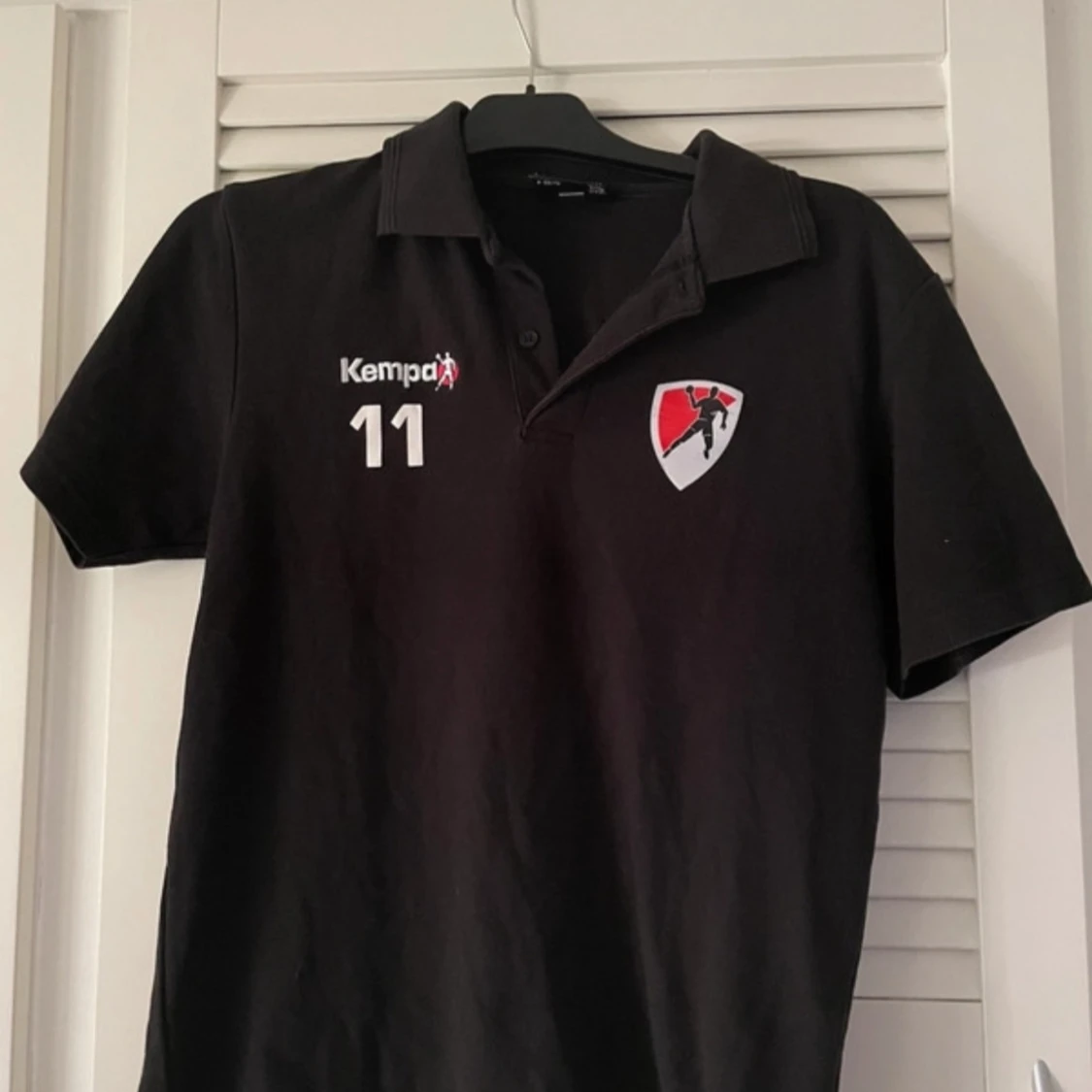 Svart pikétröja från Kempa - 1