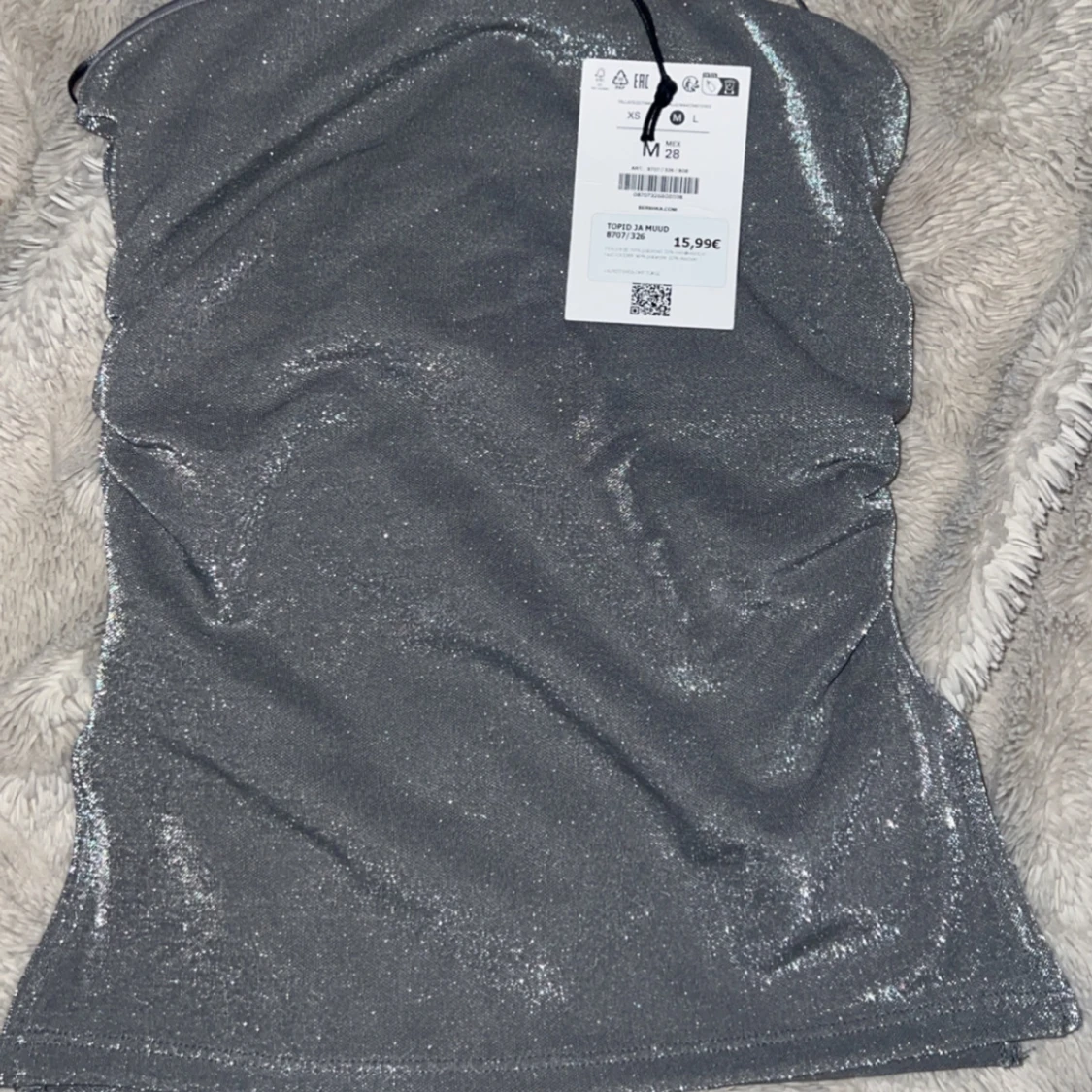 Glittrig silverfärgad tubtopp från Bershka
