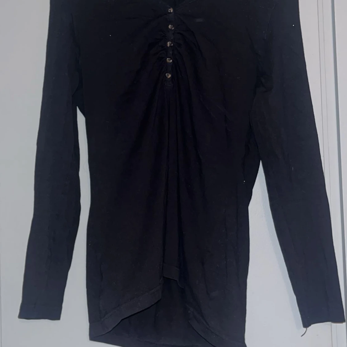 Svart långärmad topp från KappAhl