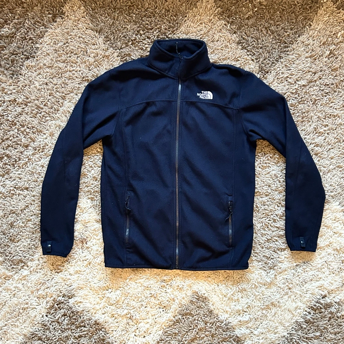 Marinblå fleecejacka, The North Face