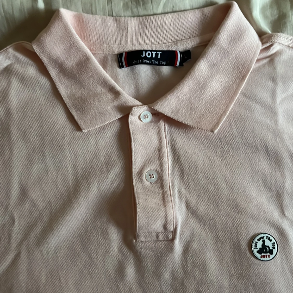 Ljusrosa pikétröja från JOTT - 90