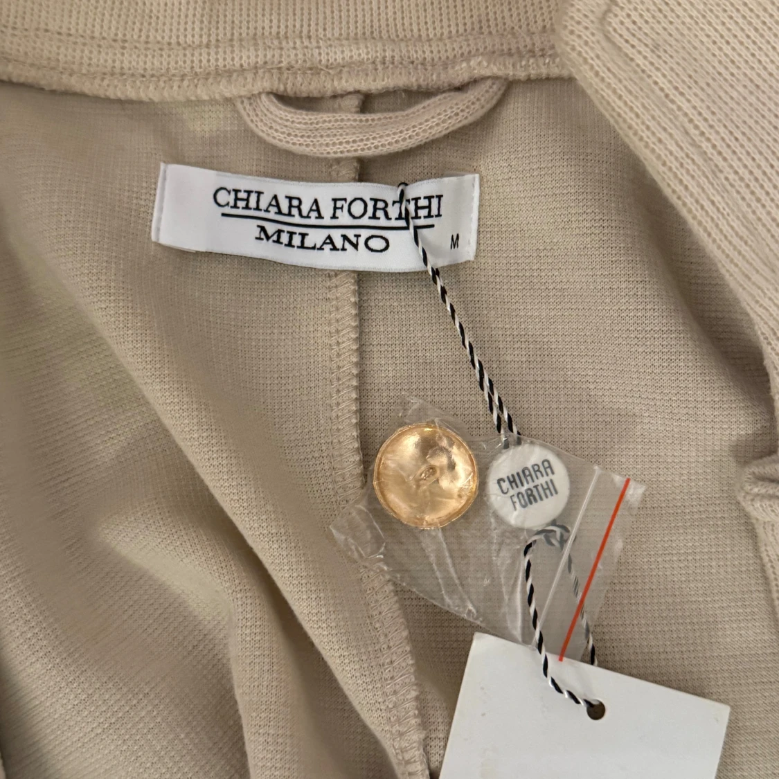 Beige kappa från Chiara Forni - 90