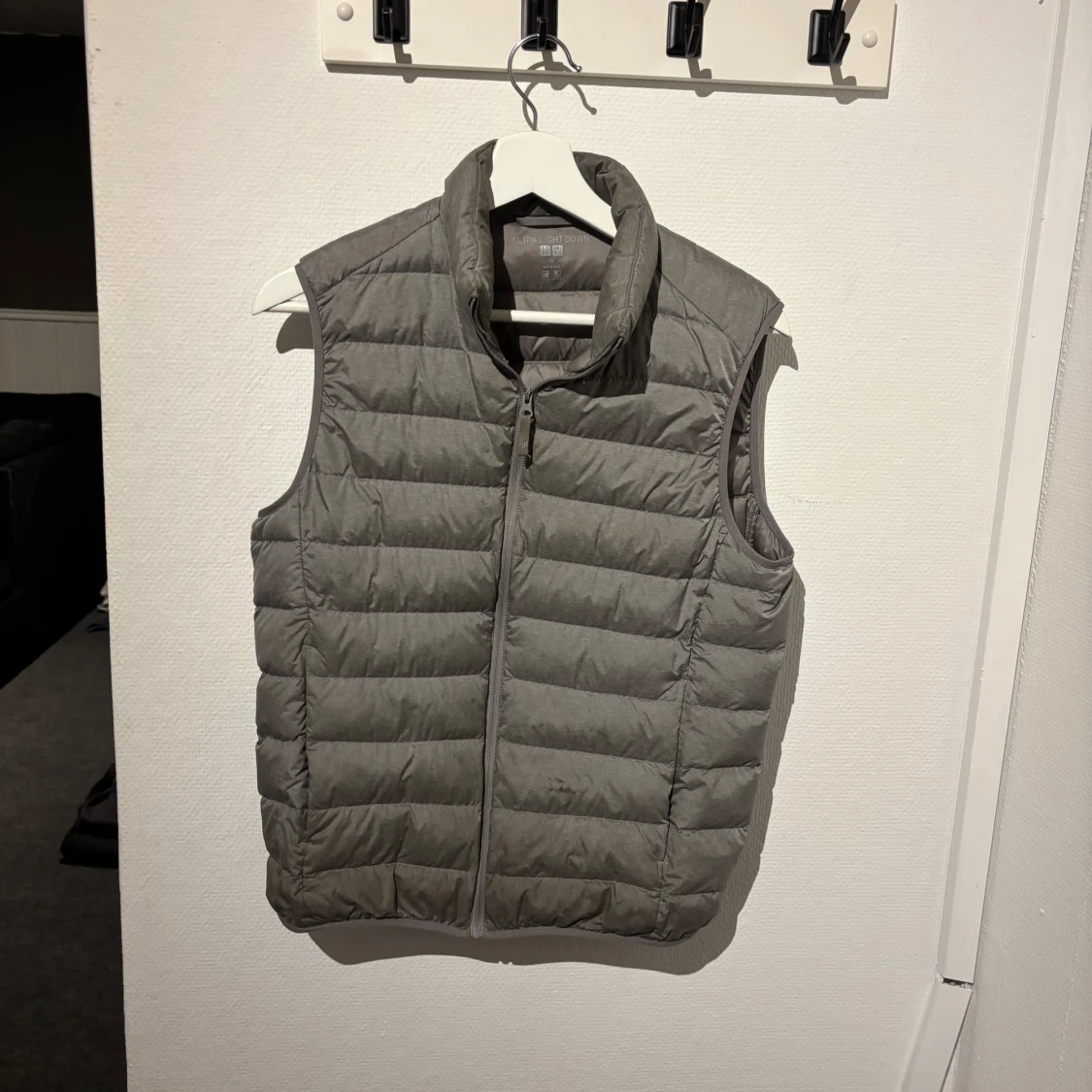 Grå dunväst Uniqlo