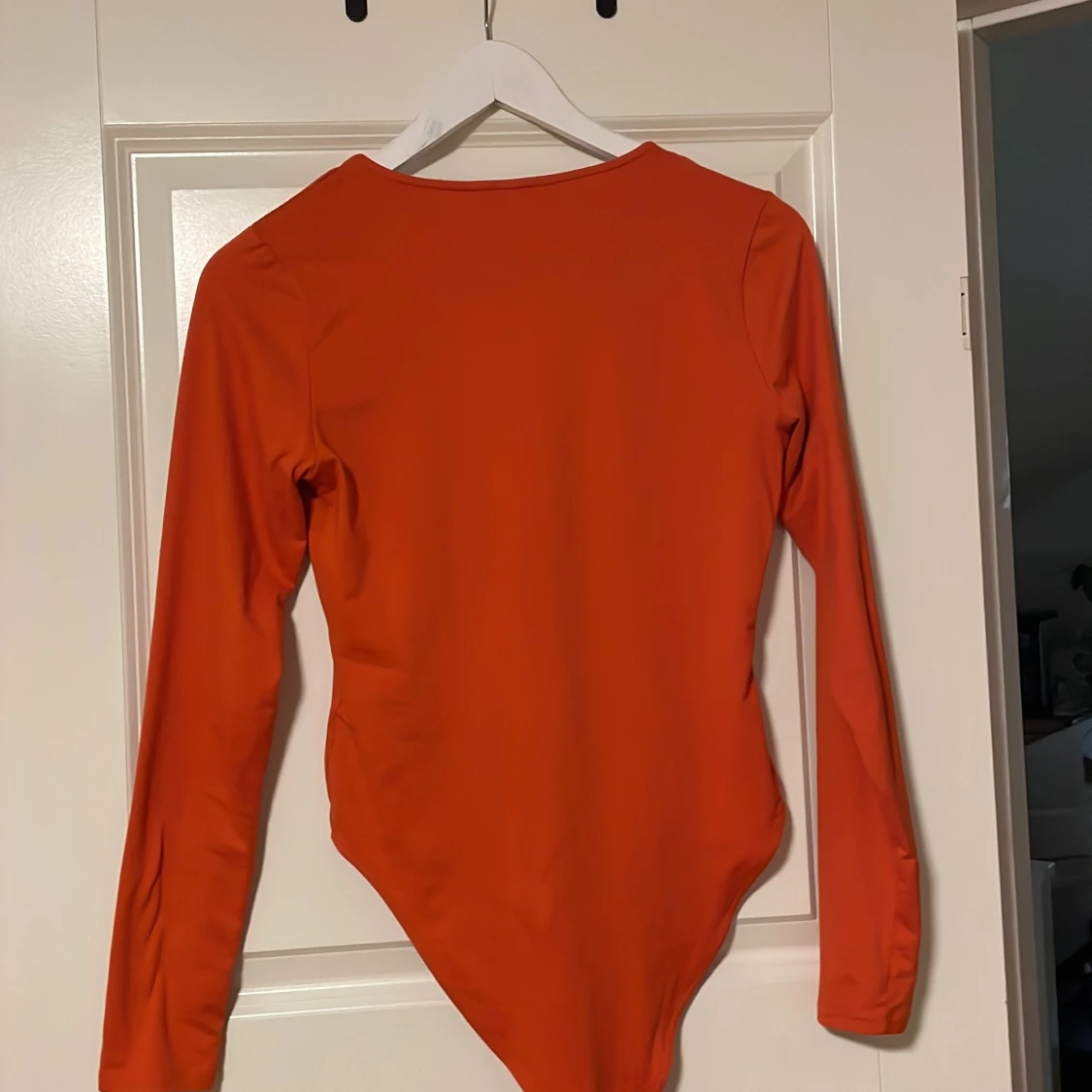 Orange långärmad body - 1