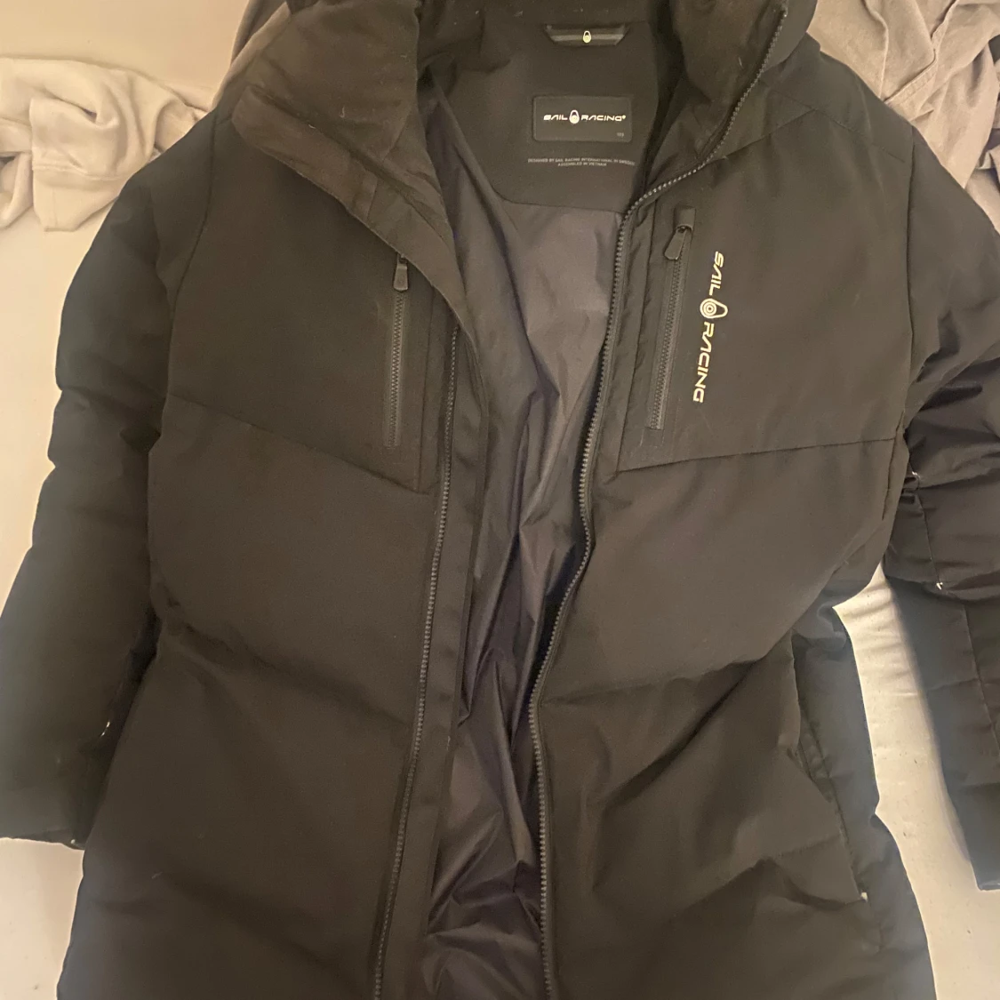 Svart pufferjacka från Sail Racing - 2