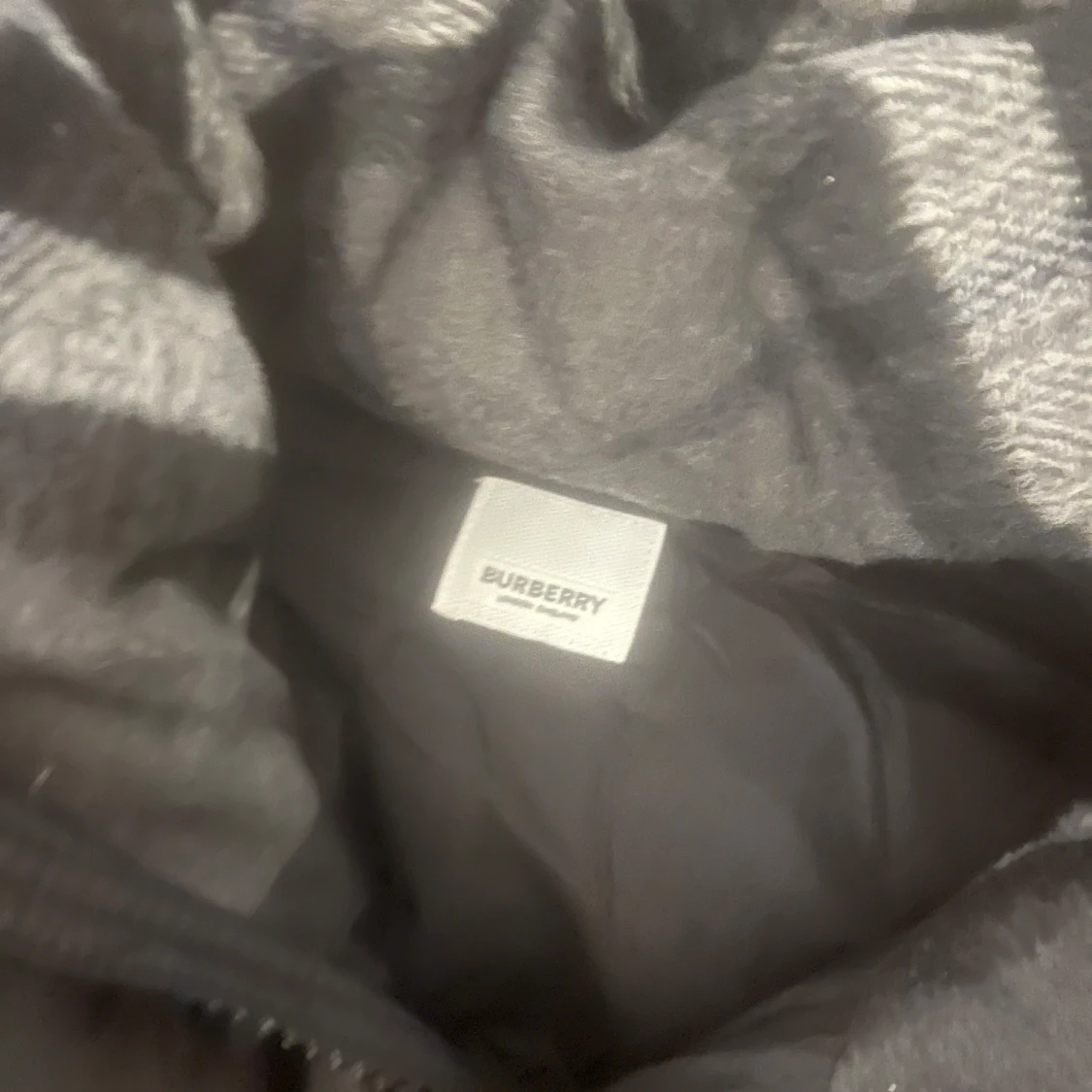 Svart dunjacka från Burberry - 91