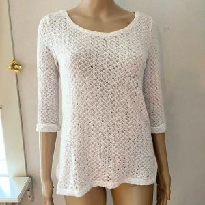 Cubus stickad tröja - En tråd som dragits lite.