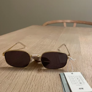 Solglasögon  - Oanvända 