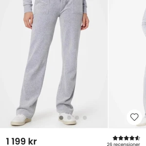 Grå mjukisbyxor med fickor - Snygga och bekväma grå mjukisbyxor med elastisk midja och praktiska fickor fram och bak. 