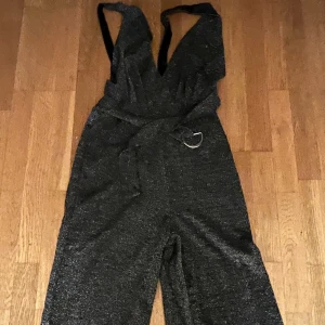 Glittrig Jumpsuit - Perfekt till nyår