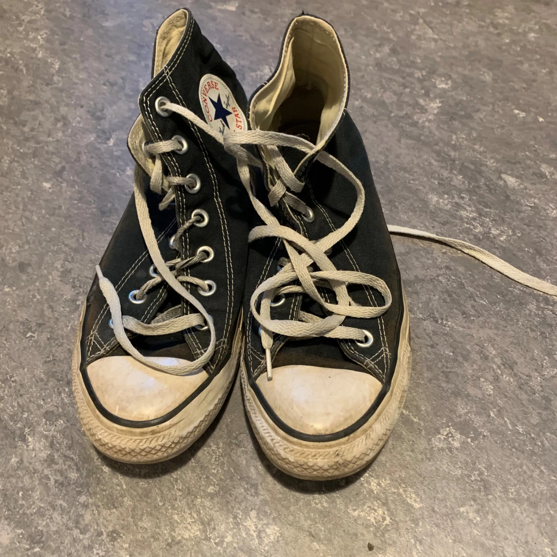 Svarta Converse All Star sneakers