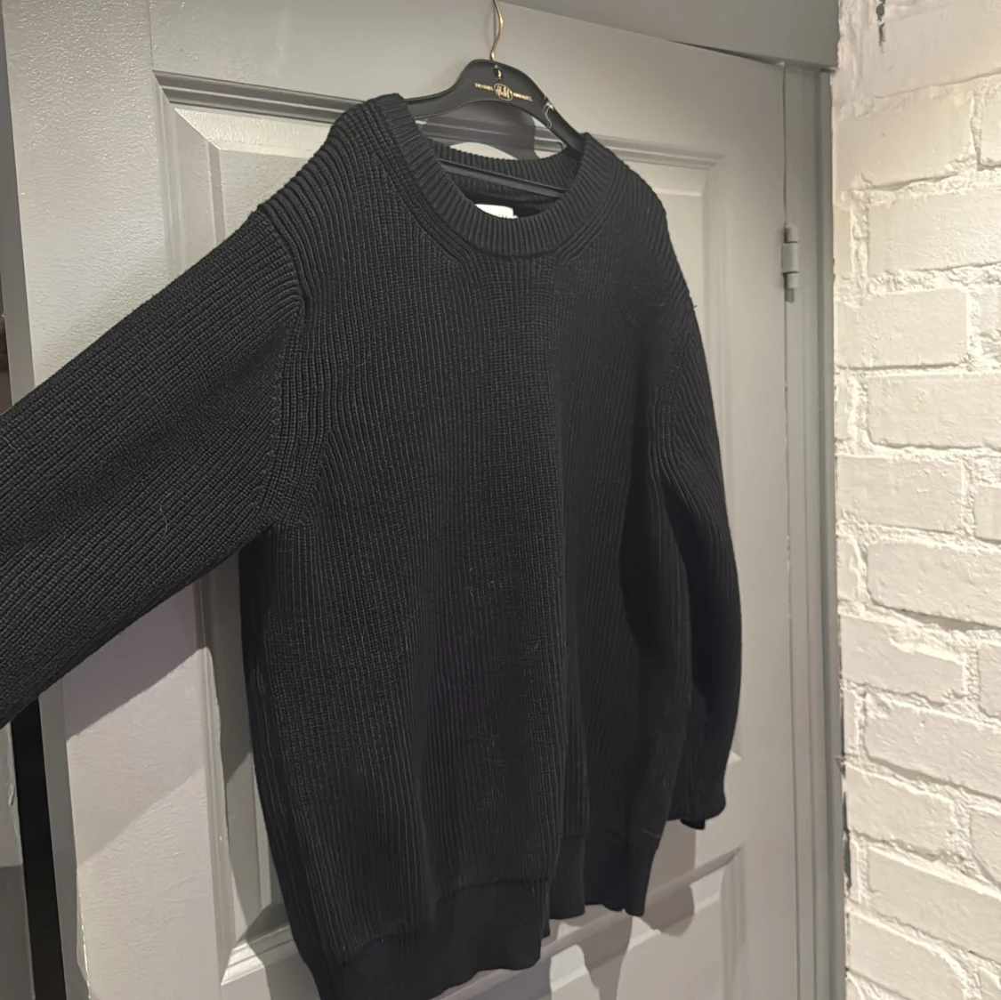 Svart stickad tröja från Maison Margiela