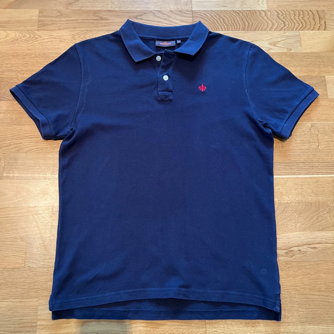 Mörkblå pikétröja från Morris