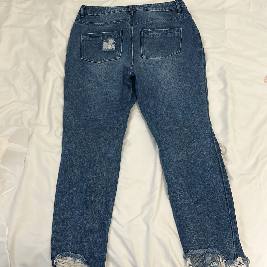 Blå slitna jeans - 90