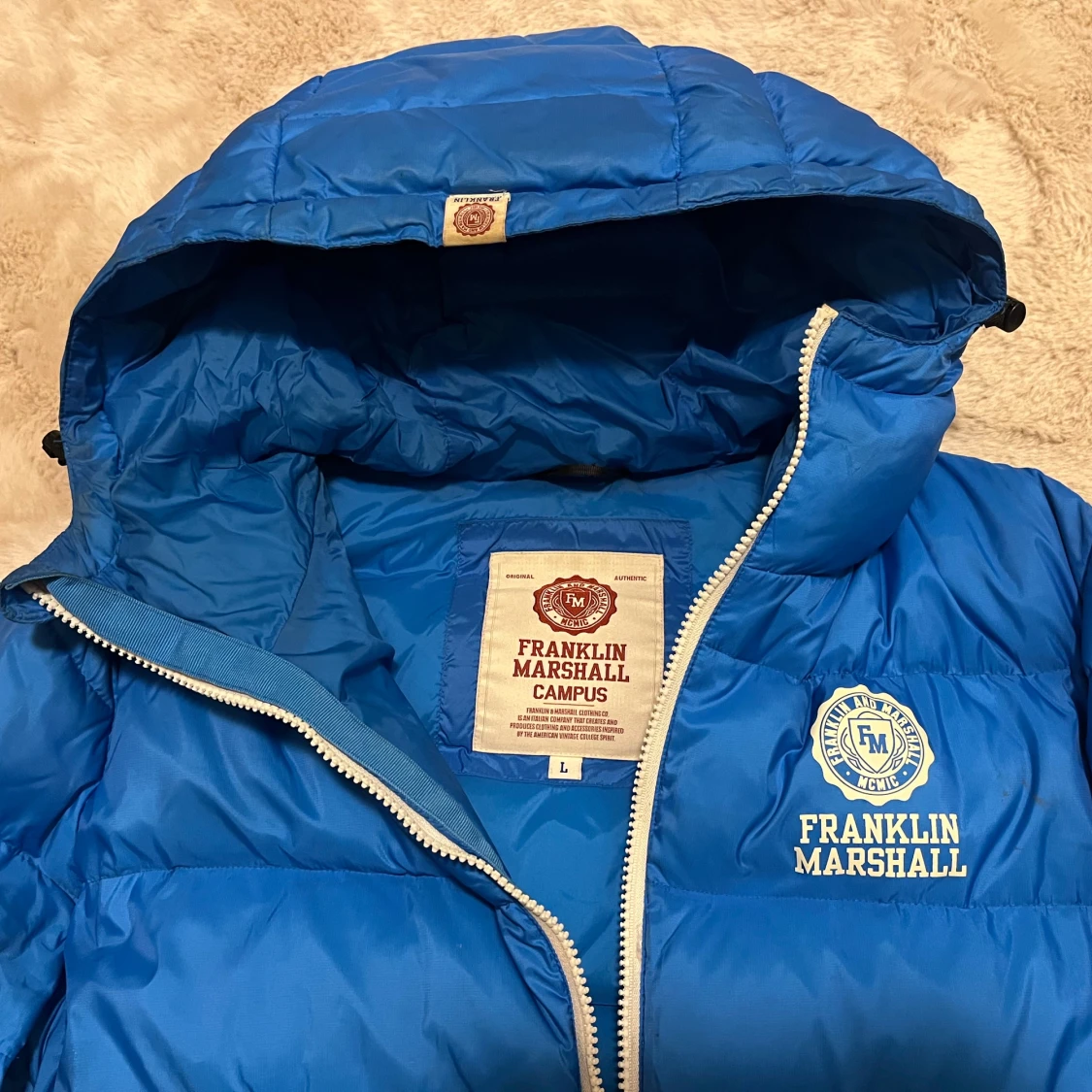 Blå dunjacka från Franklin Marshall - 91