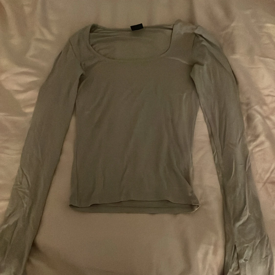 Beige långärmad topp från Gina Tricot