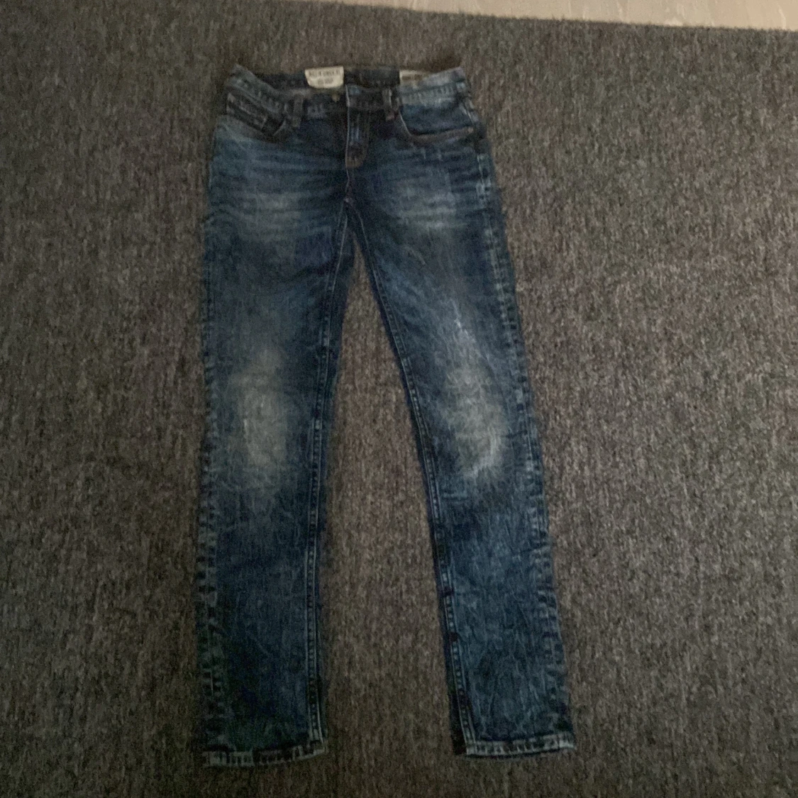 Blåa crocker jeans