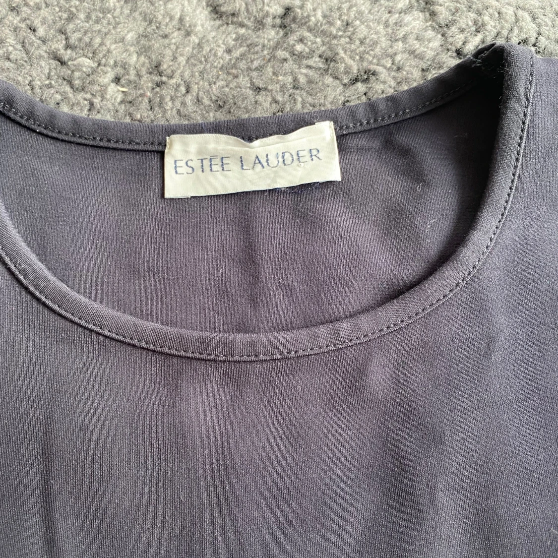 Marinblå klänning från Estee Lauder i strl S - 92