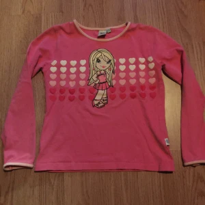 Rosa Lego Tröja - En tröja från Lego Wear i storlek 134/140 men jag har använt som croptop 