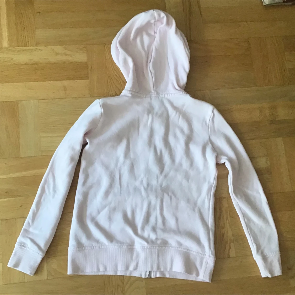 Ljusrosa huvtröja från Tommy Hilfiger - 90