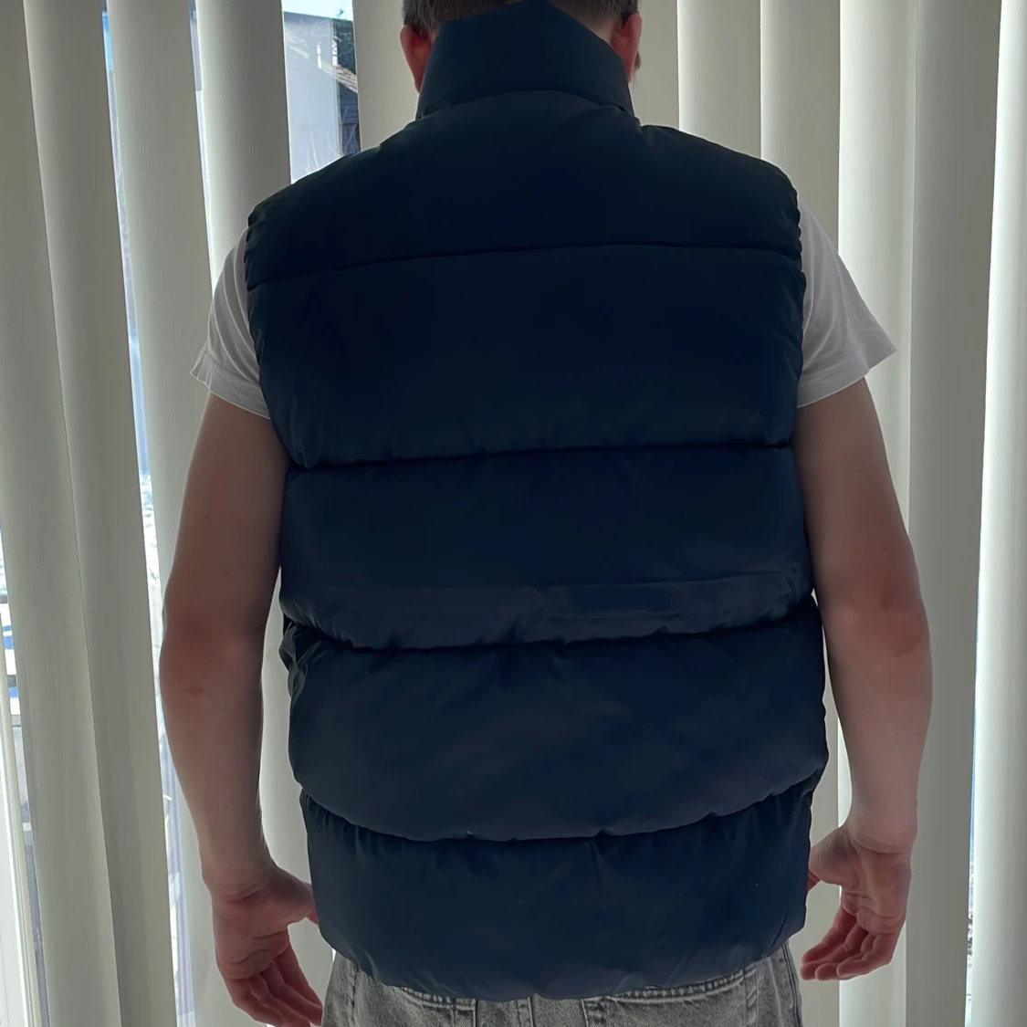 Mörkblå dunväst från Tommy Hilfiger - 1