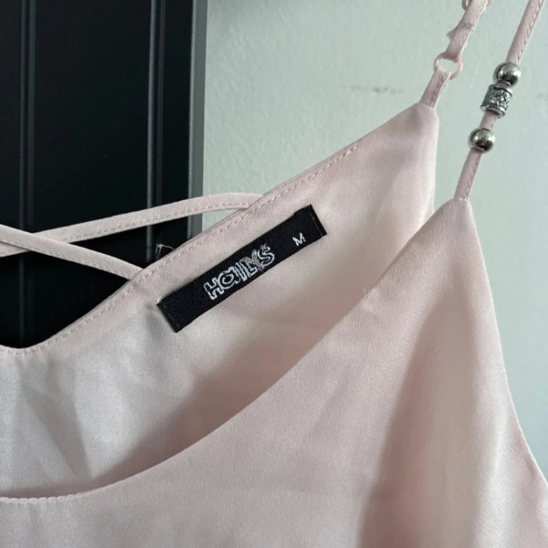 Ljusrosa linnetopp från Hollies - 1