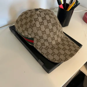 Gucci keps  - Äkta Gucci keps storlek M 