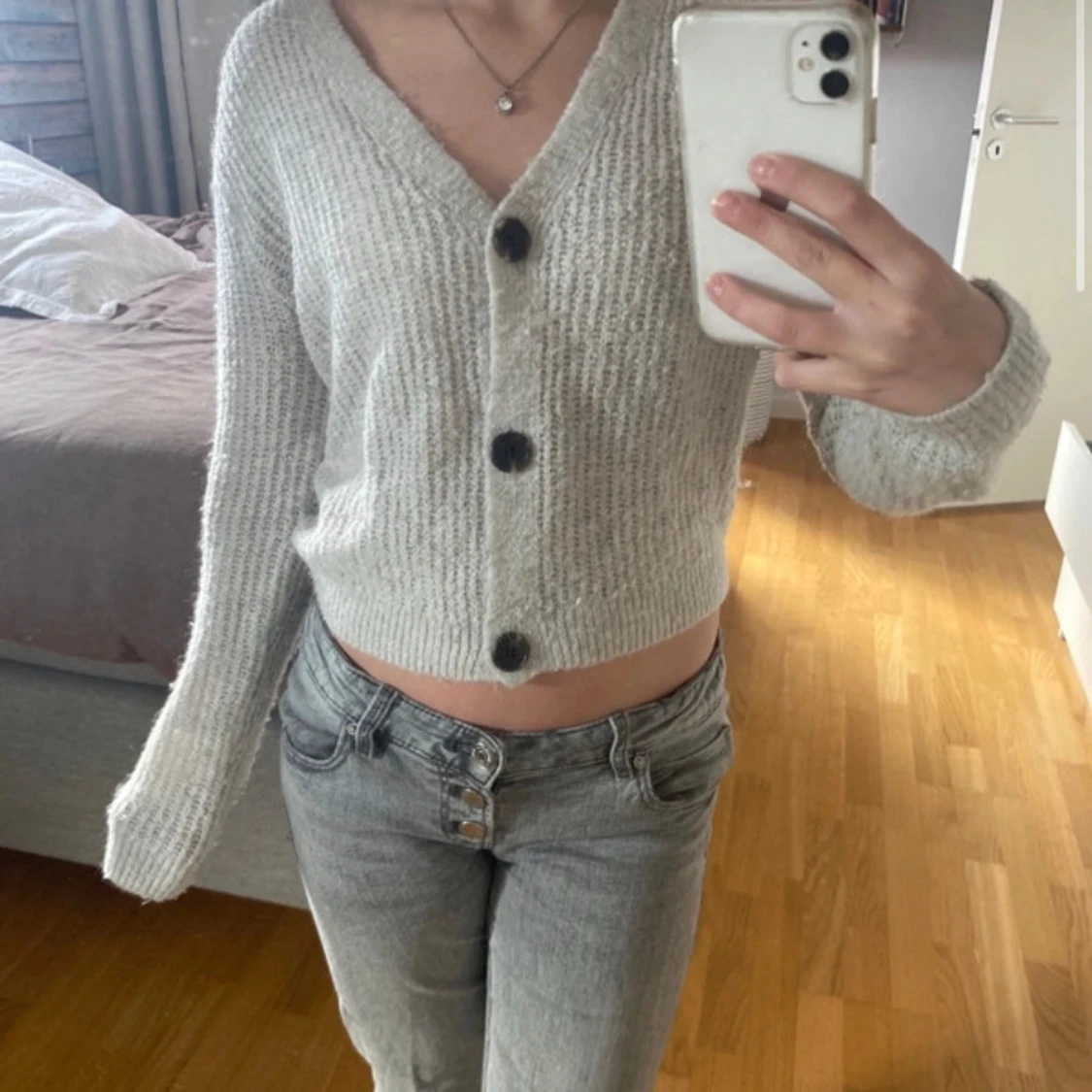 Short white cardigan