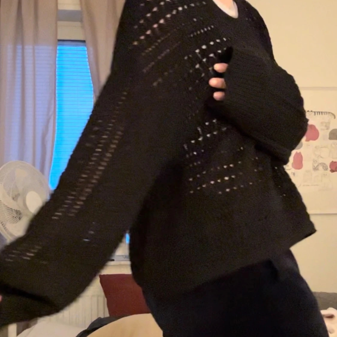 Svart stickad tröja