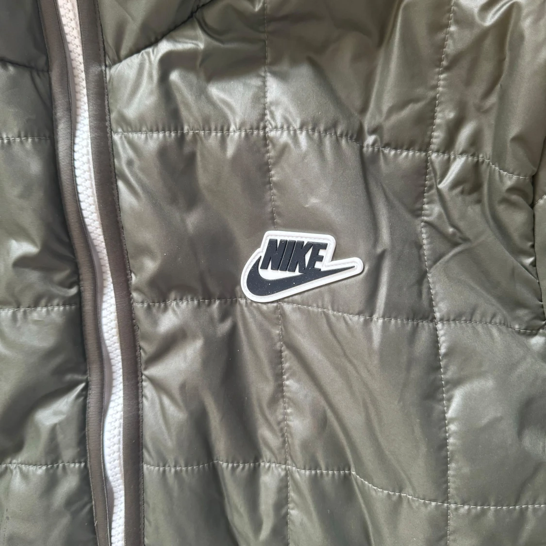 Grön quiltad jacka från Nike - 91