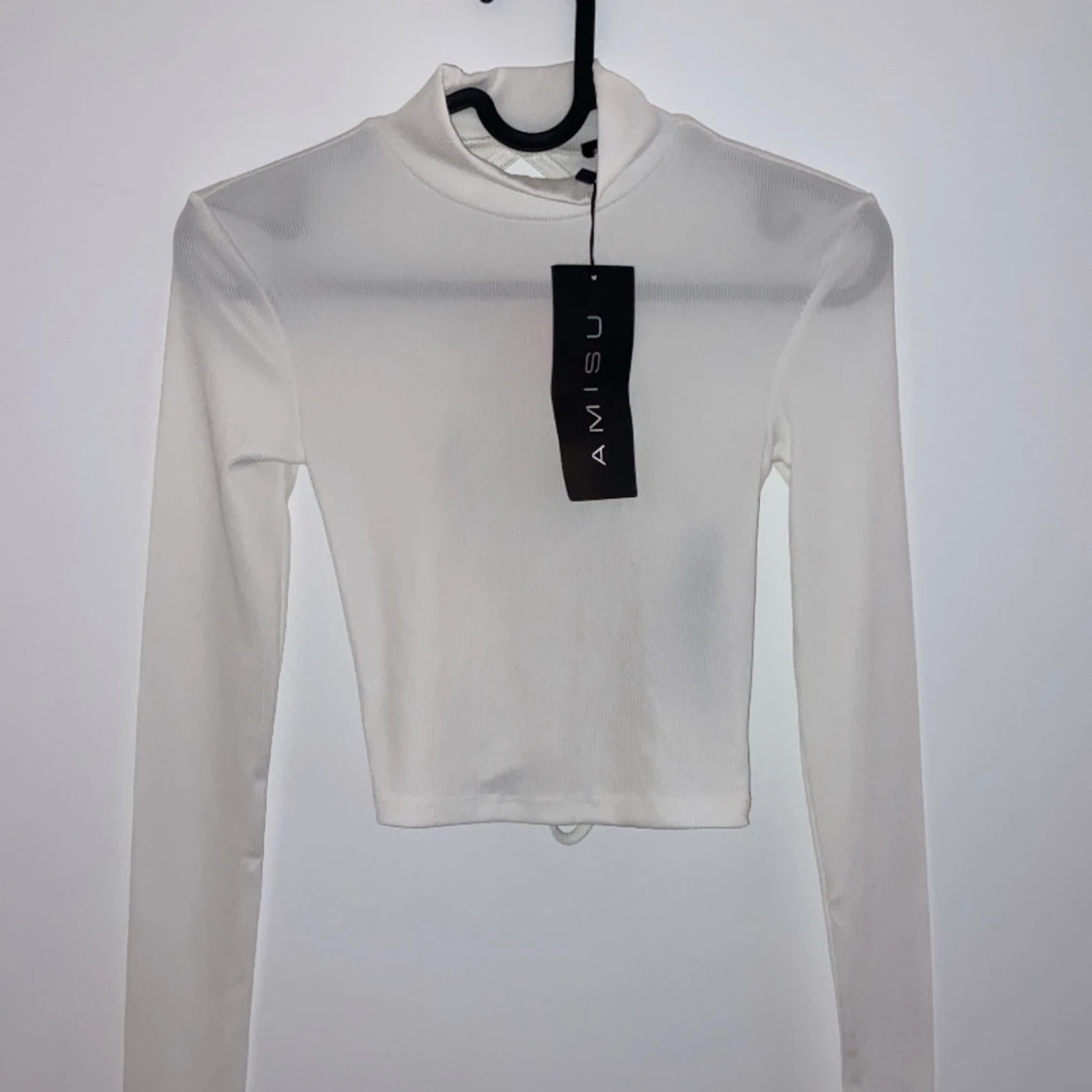 Vit långärmad topp från Amisu