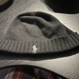 Polo Ralph Lauren mössa  - Små tecken på användning. Pris kan diskuteras vid snabb affär
