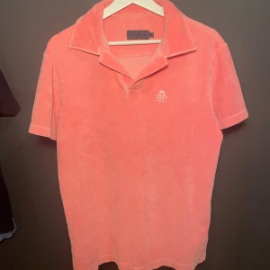 Frottépike - Rosa frottépike från märket Ruck & Maul i storlek M.