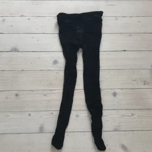 Mönstrig nätstrumpbyxa med ormmönster - Nätstrumpbyxor, one size