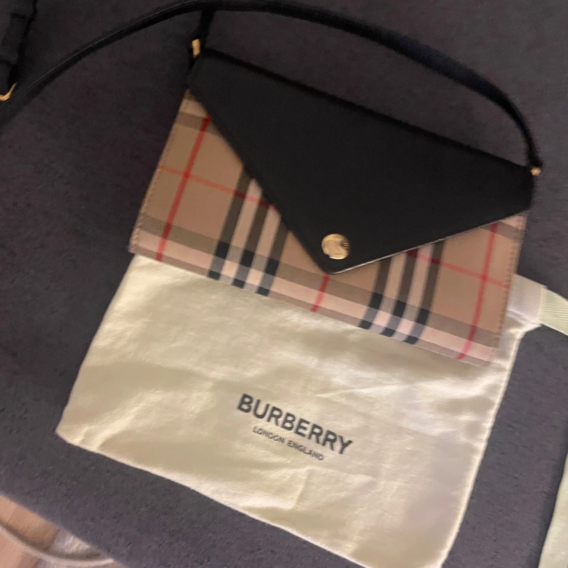 Rutig plånbok från Burberry - 2