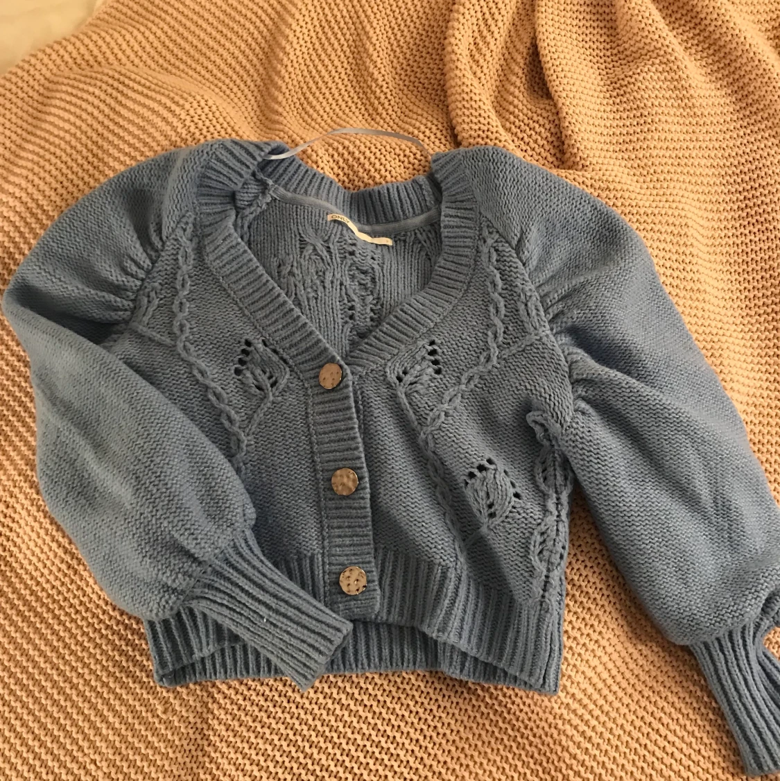 Stickad blå kofta - 90