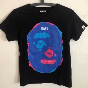Women’s Bape / A Bathing Ape Twin Head T-Shirt  Size small, women’s fit.  Great condition, no flaws or damage.  DM if you need exact size measurements.   Buyer pays for all shipping costs. All items sent with tracking number.   No swaps, no trades, no offers. 
