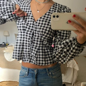 Tröja - Rutig söt topp i storlek 34