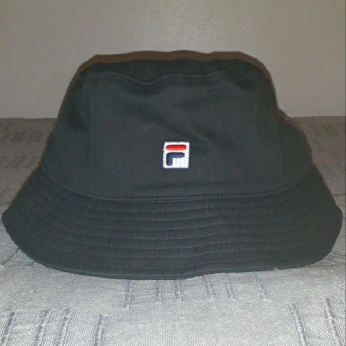 Fila hatt. Färg: Svart