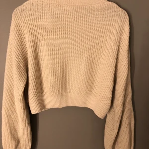 Stockad tröja  - Storlek S