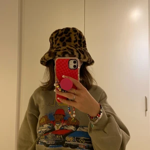  fluffy bucket hat  - 🐆 