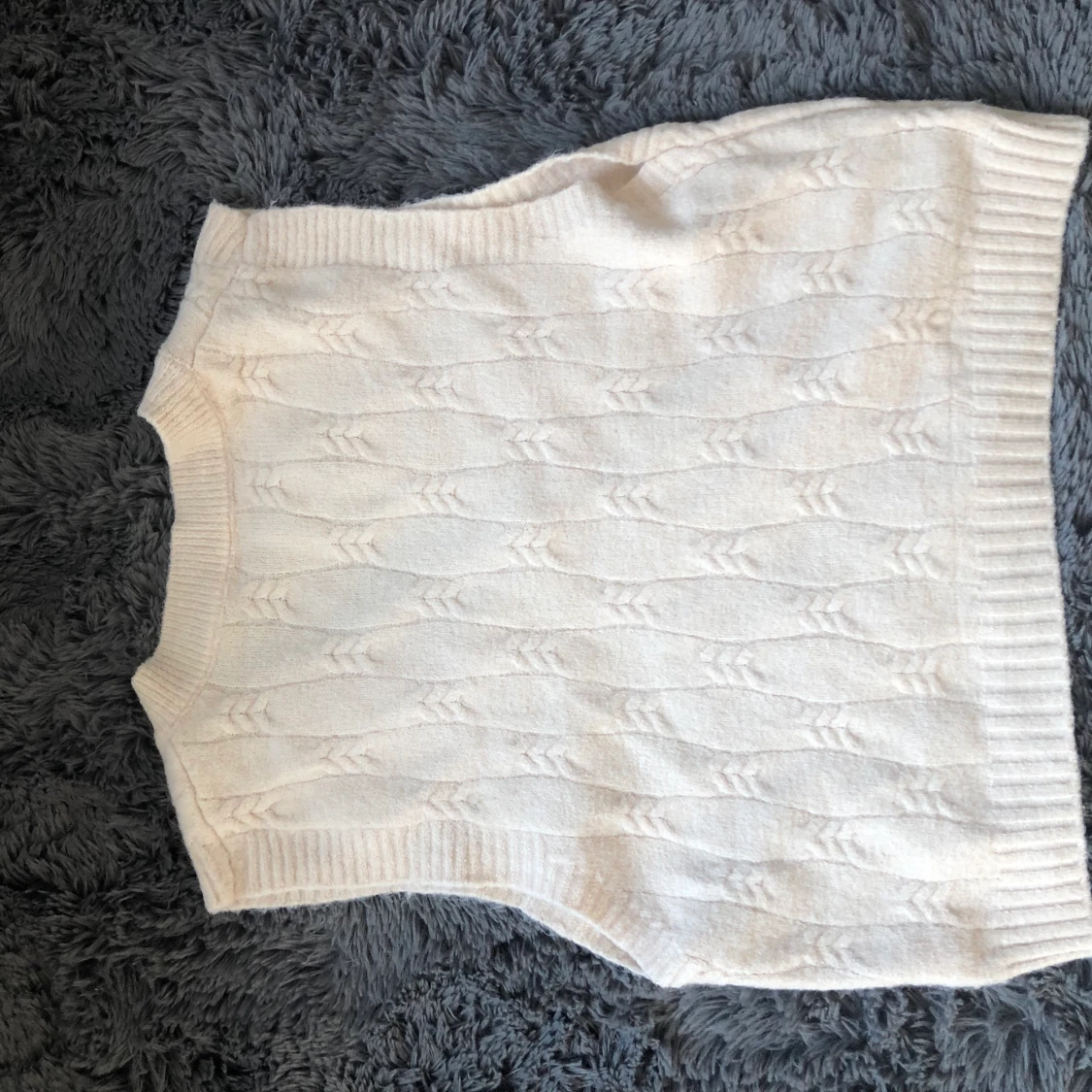 Stickad väst strl one size - 90