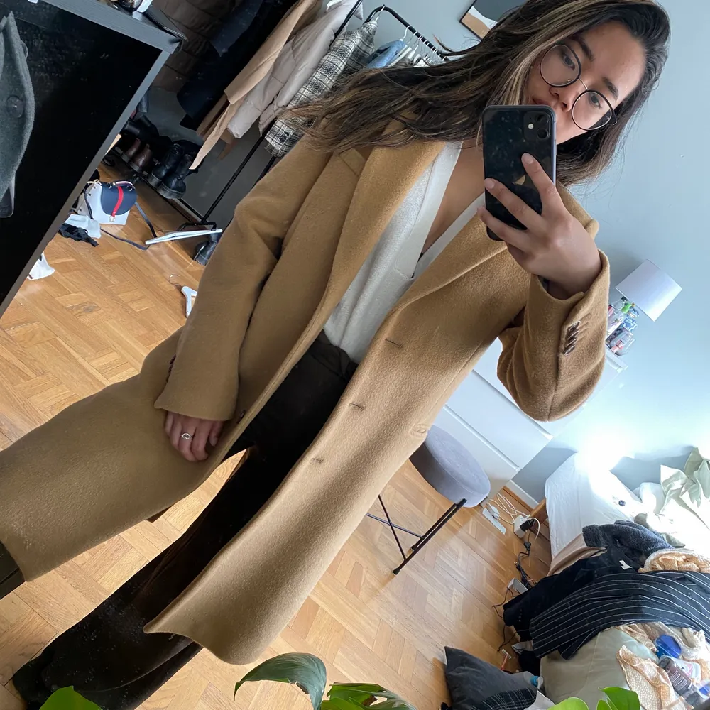 Beige wool coat from Tiger of Sweden. Have only used once and selling it because it is a little big for me. Size 36. Jackor.