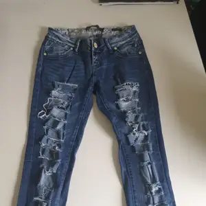Slitna jeans med leopard detaljer🖤 limited edition🖤