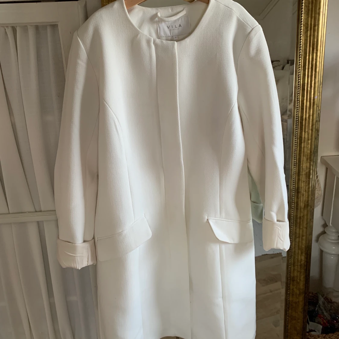 Vit kappa från Vila