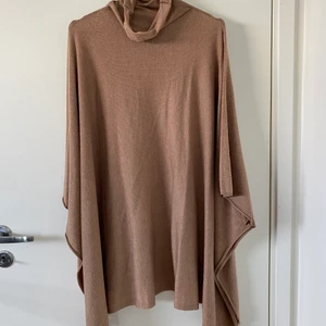 Poncho - One size poncho med polo